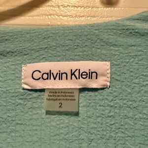 Calvin Klein Light Aqua V-Neck Puff Sleeve Dress..size 2
Elastic wide waist